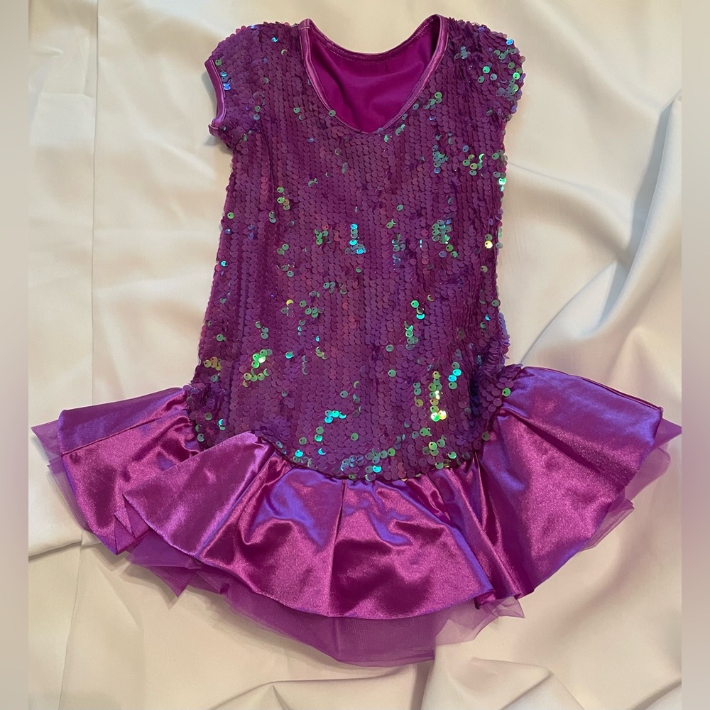 Purple sequined dance outfit. Good condition.